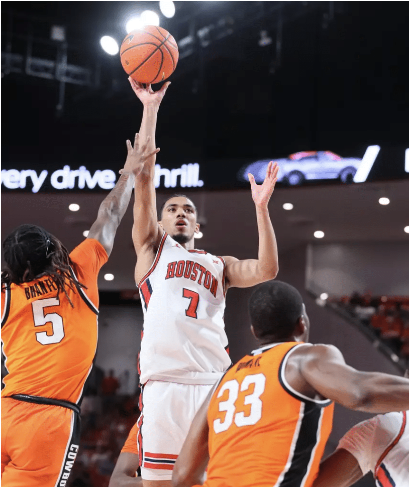 Houston basketball star Milos Uzan shoots against Oklahoma State (Photo credit: Houston Athletics, Stephen Pinchback)